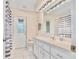 Bathroom features a large vanity, a modern sink and plenty of lighting at 4973 Sw 107Th Loop, Ocala, FL 34476