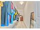 Walk-in closet with custom shelving and racks for maximum storage and organization of clothes at 4973 Sw 107Th Loop, Ocala, FL 34476