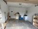 Spacious garage ready for storage with access door at 499 Water Rd, Ocala, FL 34472