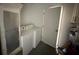 The laundry room featuring a washer and dryer at 499 Water Rd, Ocala, FL 34472