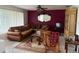 Cozy living room featuring a large sectional couch, and plenty of space for entertaining at 499 Water Rd, Ocala, FL 34472
