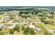 Overhead perspective showcasing a well-planned neighborhood with neatly arranged homes and peaceful surroundings at 5 Dogwood Loop Ave, Ocala, FL 34472