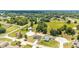 Scenic aerial view of homes in a suburban neighborhood, featuring spacious lots and tree-lined streets at 5 Dogwood Loop Ave, Ocala, FL 34472