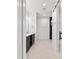 Well-lit bathroom with modern vanity, tiled floors, and updated fixtures at 5 Dogwood Loop Ave, Ocala, FL 34472