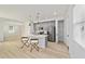 Open kitchen with pendant lights, stainless steel appliances, and a pantry at 5 Dogwood Loop Ave, Ocala, FL 34472