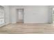 Open living space with light hardwood floors and natural light at 5 Dogwood Loop Ave, Ocala, FL 34472