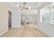 Open floor plan featuring hardwood floors, recessed lighting, and an open concept kitchen at 5 Dogwood Loop Ave, Ocala, FL 34472