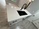 Close-up of kitchen island with a modern sink and elegant countertop at 5 Laurel Pass Ln, Ocala, FL 34472