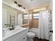 Charming bathroom with modern vanity, decorative accents, and a bathtub-shower combination at 501 Marion Oaks Dr, Ocala, FL 34473