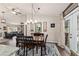 Cozy dining area with views to the living room and outdoor patio at 501 Marion Oaks Dr, Ocala, FL 34473