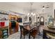Open-concept kitchen and dining area with a view of the entryway at 501 Marion Oaks Dr, Ocala, FL 34473