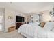Bright main bedroom featuring soft carpet, neutral paint and sliding glass door at 501 Marion Oaks Dr, Ocala, FL 34473