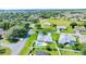 Aerial view of a beautiful home with a pool and spacious green lawn at 5459 Sw 86Th St, Ocala, FL 34476