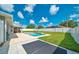 The backyard offers a sparkling pool, a spacious patio and plenty of room for entertaining in a private setting at 5459 Sw 86Th St, Ocala, FL 34476