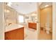 Bright bathroom with a large vanity, soaking tub and separate toilet area at 5459 Sw 86Th St, Ocala, FL 34476
