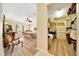 Comfortable bedroom with ceiling fan and view into a walk-in closet with shelving and storage at 5459 Sw 86Th St, Ocala, FL 34476