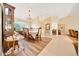 Elegant dining room with a chandelier, perfect for hosting formal dinners and gatherings at 5459 Sw 86Th St, Ocala, FL 34476