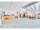 Large two-car garage with abundant storage space and well-organized tools at 5459 Sw 86Th St, Ocala, FL 34476