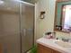 A bright and clean bathroom featuring a glass shower and a nice vanity at 5862 Sw 160Th Ct, Ocala, FL 34481