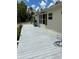 Spacious deck with grill and view of yard at 5862 Sw 160Th Ct, Ocala, FL 34481