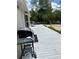 Spacious deck with grill and view of yard at 5862 Sw 160Th Ct, Ocala, FL 34481