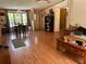 Open-concept dining room featuring chandelier and light peach walls at 5862 Sw 160Th Ct, Ocala, FL 34481