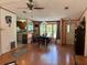 Light-filled dining room with view into kitchen and living areas at 5862 Sw 160Th Ct, Ocala, FL 34481