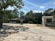 Exterior view of property with residence, carports and sheds at 5862 Sw 160Th Ct, Ocala, FL 34481