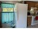 This kitchen offers ample light and modern appliances at 5862 Sw 160Th Ct, Ocala, FL 34481