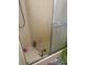 Enclosed shower stall with sliding glass doors at 5862 Sw 160Th Ct, Ocala, FL 34481