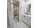 Bathroom showcasing stand up shower, and modern vanity at 6475 Nw 61St Ave, Ocala, FL 34482