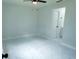 Bedroom featuring marble floors and a ceiling fan at 6475 Nw 61St Ave, Ocala, FL 34482