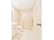 Bathroom with sliding shower door, toilet, and vanity sink at 6631 Se 11Th Loop, Ocala, FL 34472