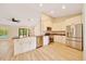 Modern kitchen featuring stainless steel appliances, granite countertops, and ample cabinet space at 6631 Se 11Th Loop, Ocala, FL 34472