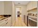 Convenient laundry room with modern washer, dryer, and ample storage space at 6631 Se 11Th Loop, Ocala, FL 34472