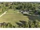 Aerial view showcasing a sprawling property, single-story home, and large manicured lawn at 6730 Sw 9Th Ave, Ocala, FL 34476