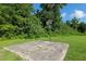 Dilapidated basketball court in the backyard at 6730 Sw 9Th Ave, Ocala, FL 34476