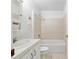 Modest bathroom featuring a sink, toilet and shower/tub at 6730 Sw 9Th Ave, Ocala, FL 34476