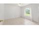 Bedroom with window and white walls at 6730 Sw 9Th Ave, Ocala, FL 34476