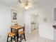 View of small eating area with view of laundry room with modern washer and dryer at 6730 Sw 9Th Ave, Ocala, FL 34476