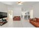 Spacious open living area features tile flooring, neutral paint, and seamless flow at 6730 Sw 9Th Ave, Ocala, FL 34476