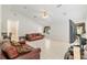 Spacious living room features tile floors, ceiling fan, and a large window with lots of light at 6730 Sw 9Th Ave, Ocala, FL 34476