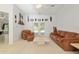 Spacious living room featuring tile flooring and neutral walls, offering a versatile area for relaxation and entertainment at 6730 Sw 9Th Ave, Ocala, FL 34476