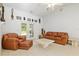 Open living space with tile floors and light walls, offering a spacious and versatile area for living and entertaining at 6730 Sw 9Th Ave, Ocala, FL 34476
