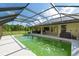 Backyard pool with green water and screened-in lanai at 6730 Sw 9Th Ave, Ocala, FL 34476