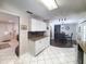 Open kitchen with modern appliances, granite countertops, and ample storage space for cooking enthusiasts at 6814 Se 53Rd Pl, Ocala, FL 34472