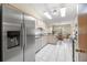 Well-lit kitchen showcasing stainless steel refrigerator and appliances at 7443 Sw 102Nd Pl, Ocala, FL 34476