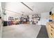 Spacious and well-organized garage with ample storage, workbenches, and room for multiple vehicles at 9746 Sw 108Th Terrace Rd, Ocala, FL 34481