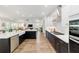 Modern kitchen with an island, light countertops, and stainless appliances at 9746 Sw 108Th Terrace Rd, Ocala, FL 34481
