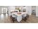 Stylish kitchen featuring stainless appliances, a large island, and a breakfast bar at 9746 Sw 108Th Terrace Rd, Ocala, FL 34481